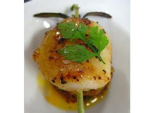 Pan-Seared Scallop in Shell with Brown Butter Hazelnut Emulsion, Charred Chanterelle & Crispy Lardons